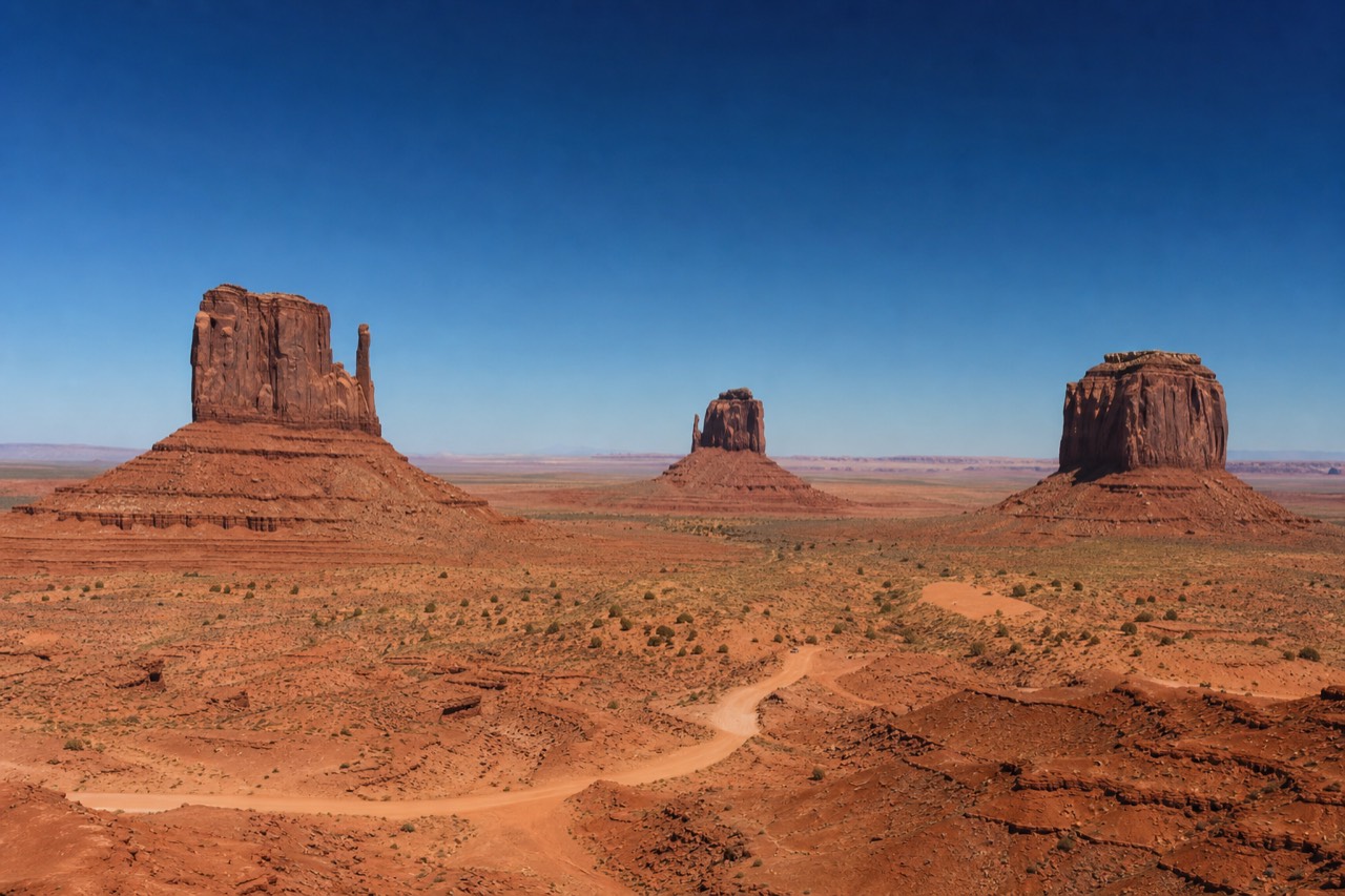The West and East Mitten Buttes with Merrick Butte in Monument Valley from the visitor center overlook